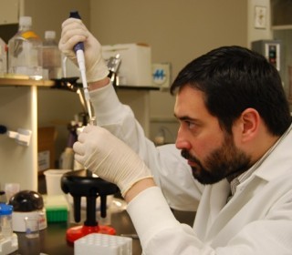 Dr. Pacheco-Quinto in the laboratory
